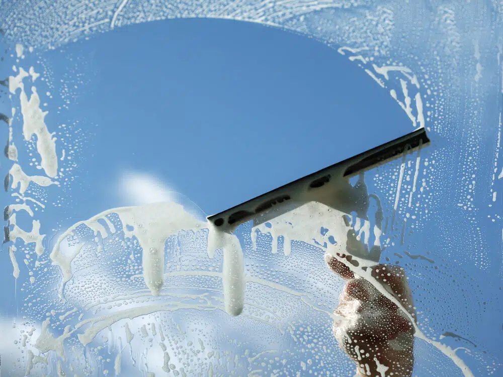 Cleaning a paving slab with a high pressure surface cleaner
