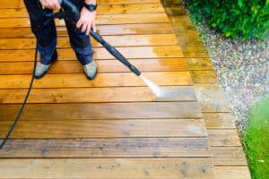 cleaning terrace with a pressure washer