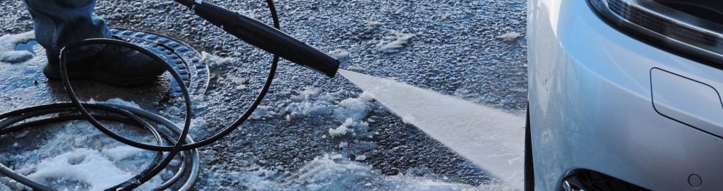 Washing down a work vehicle